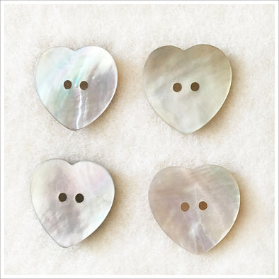 Set of large heart shaped abalone shell buttons. Set of four.
