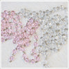 8mm beaded rosary chain. Pink and clear.