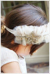Ruffled tulle headband with star appliqué.